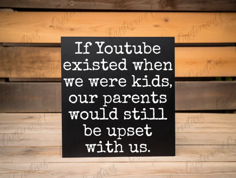 If Youtube existed when we were kids, our parents would still be upset with us. Black sign with white lettering.