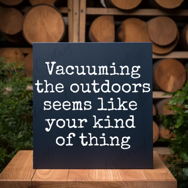 Vacuuming the outdoors seems like your kind of thing. Dark blue sign with white lettering.