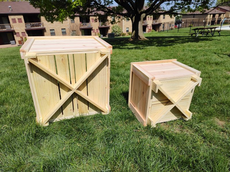 22 inch and 15 inch planters next to each other. Bottom view.