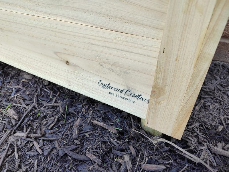 54 inch planter Oysterwood logo.