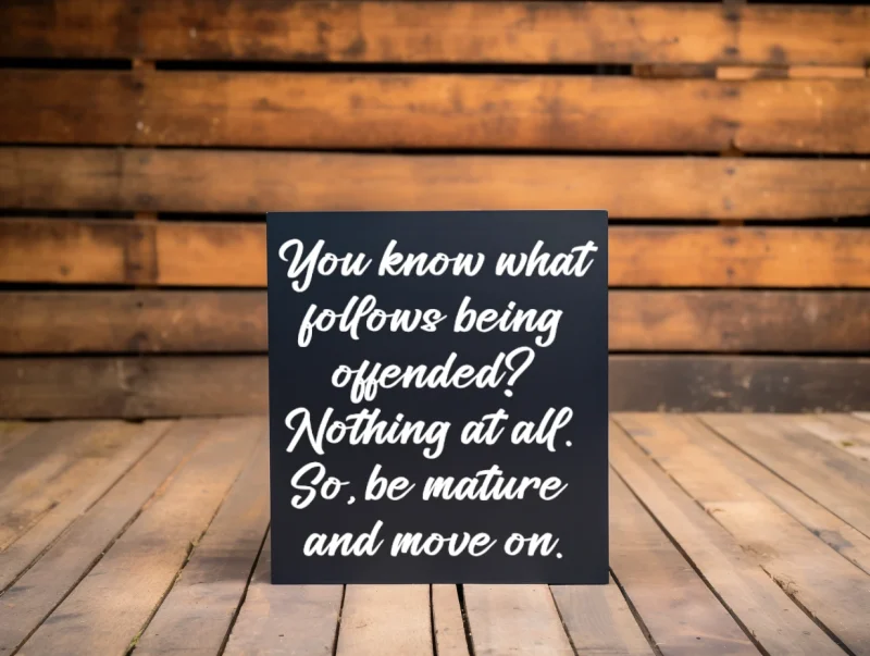 You know what follows being offended? Nothing at all. So, be mature and move on. Blue sign with white lettering.