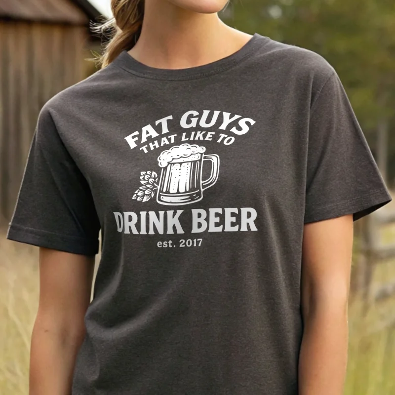 Fat guys that like to drink beer.. Female model closeup. Charcoal t-shirt with white text .
